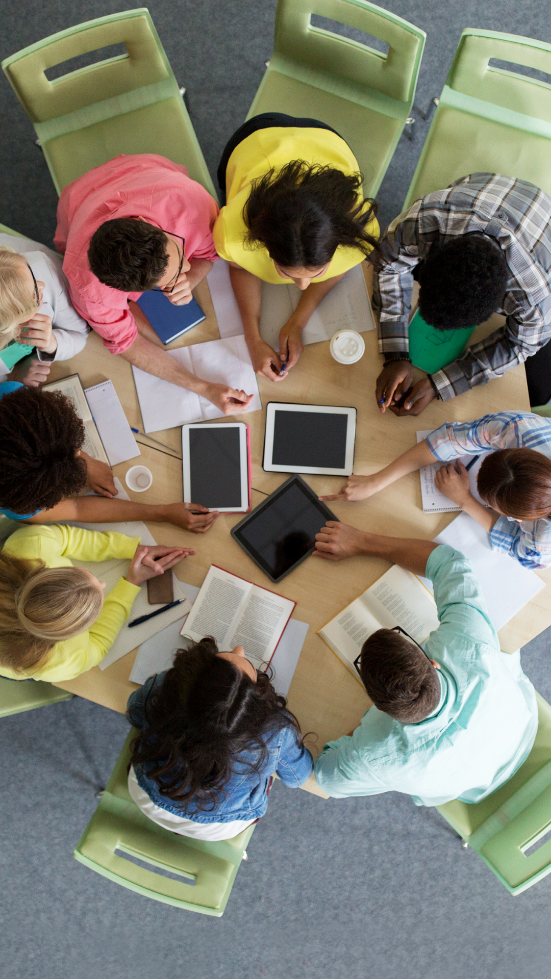 A group of people sitting in a circle during a focus group